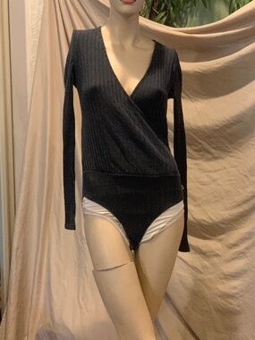 Long sleeved body suit
